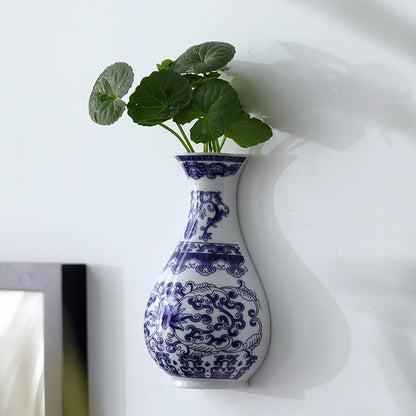 Decorative ceramic vase for the wall